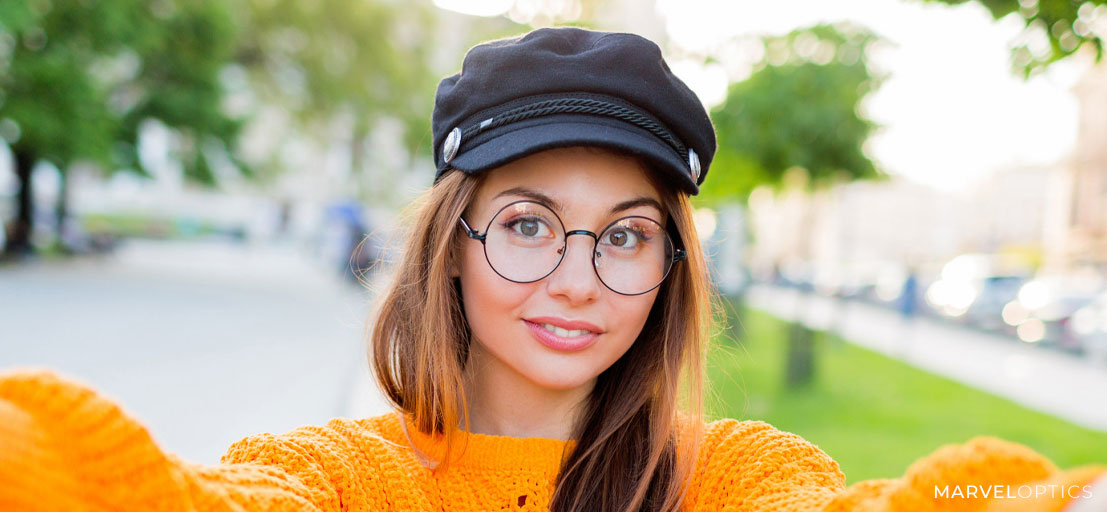 woman wearing round glasses