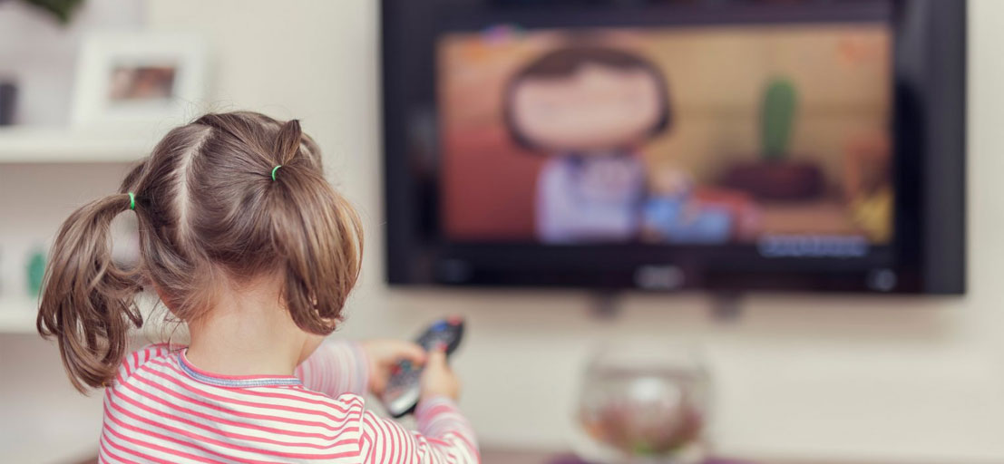 kid watching television