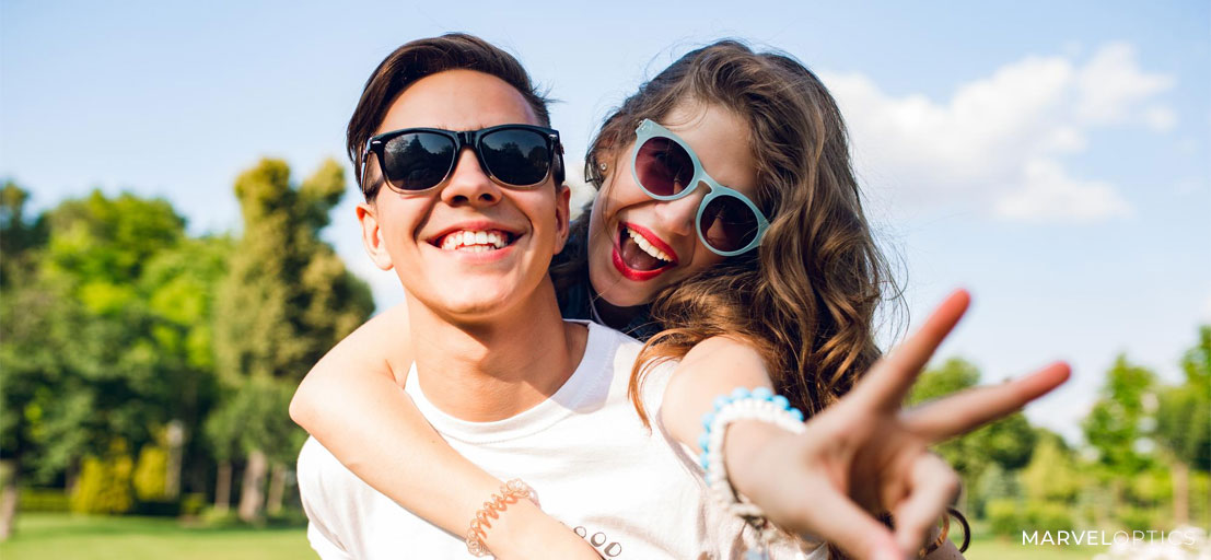 couple wearing prescription sunglasses