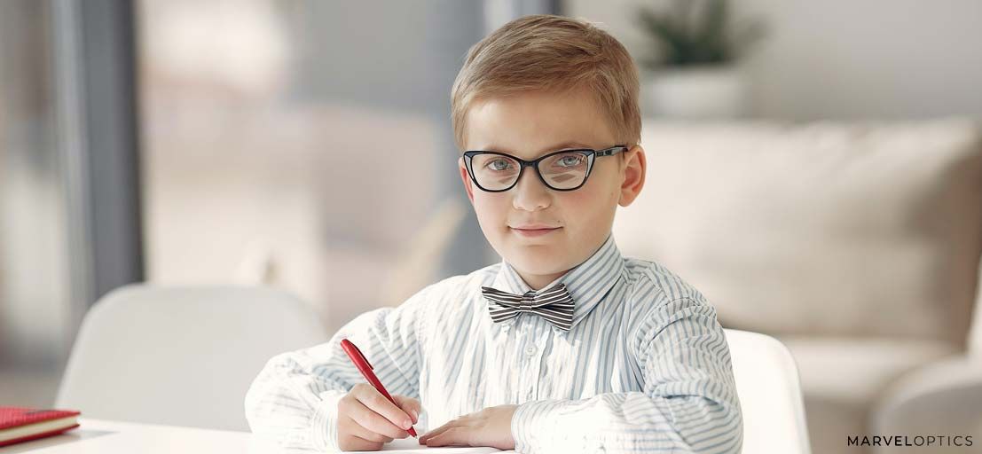 kid wearing eyeglass