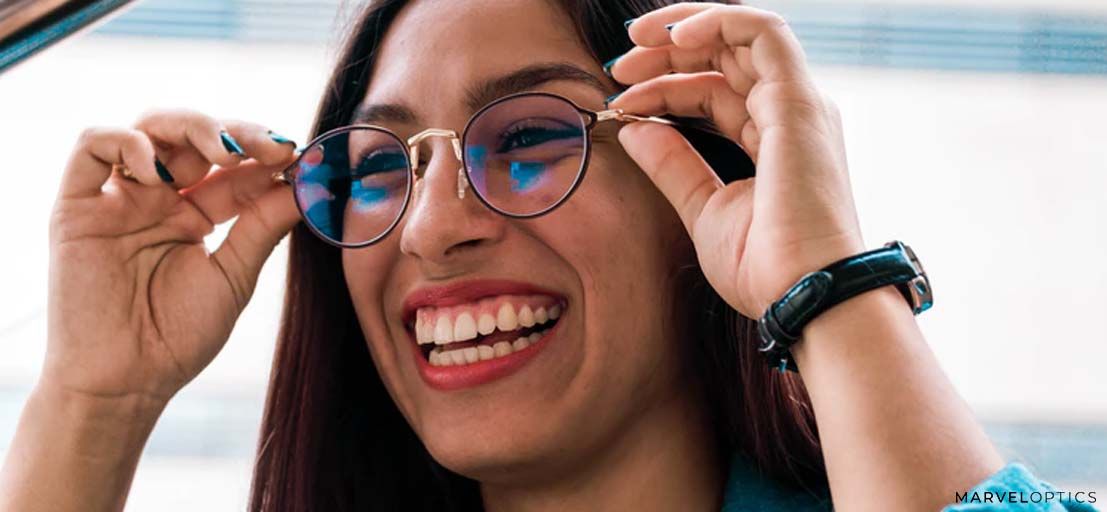 woman smiling with glasses