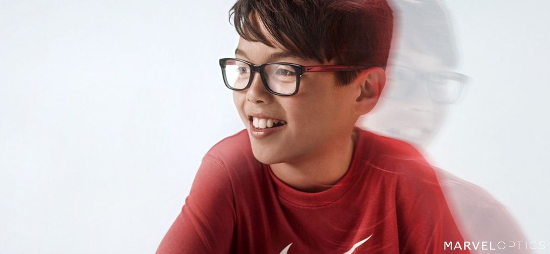 kid wearing nike sunglasses