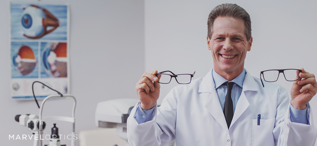 eye doctor holding an eyeglass